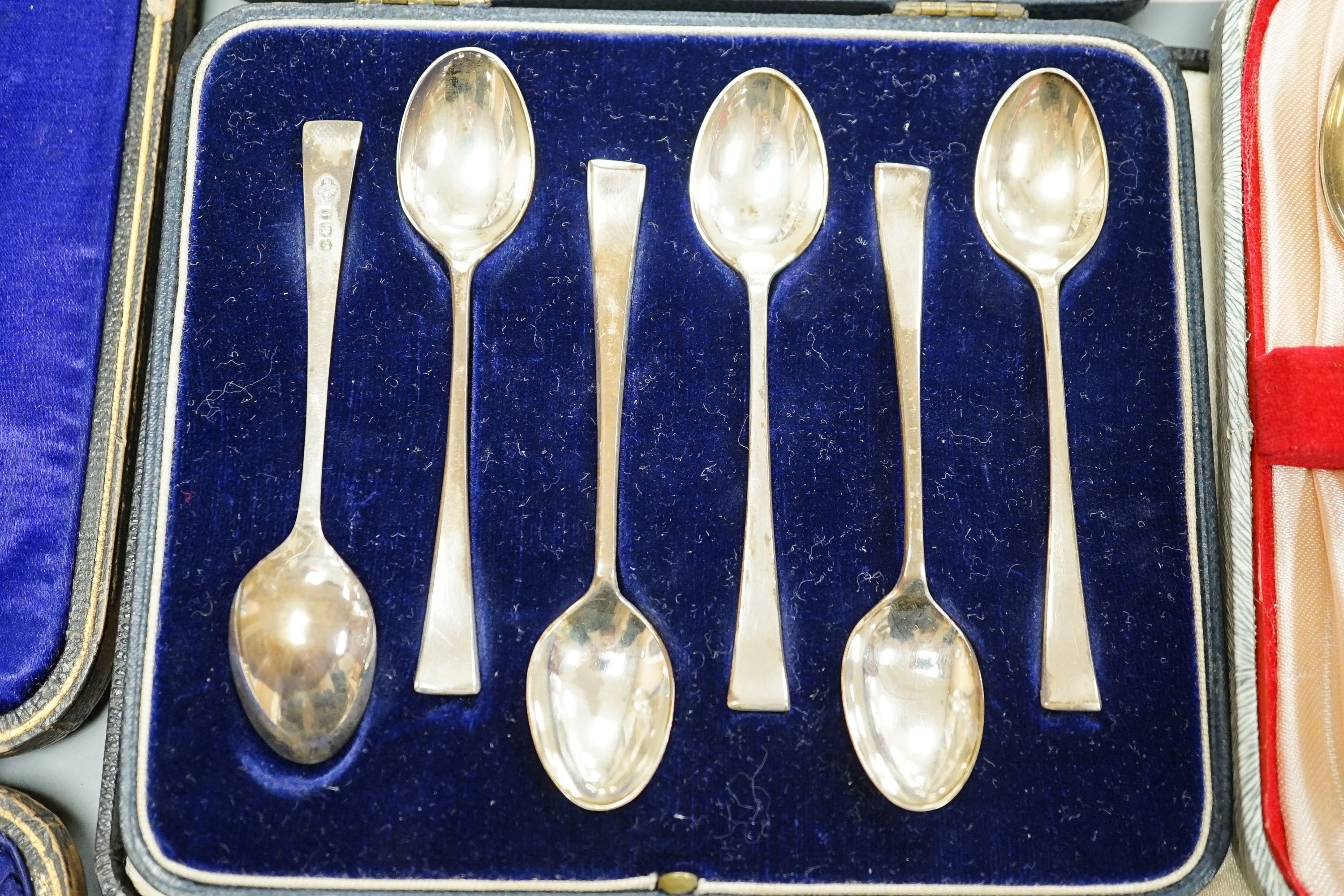 Seven assorted cased sets of English silver tea and coffee spoons, including a set of twelve silver gilt teaspoons, London, 1882 (one set incomplete).